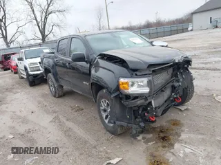 2021 GMC Canyon 4WD AT4 w/Leather with VIN 1GTG6FEN4M1103068, listed as a IAAI auction lot 41673275 with 62,254 mi miles. Bid and sale history available at carsss.com. Image 1.