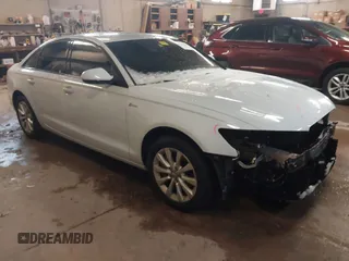 2012 Audi A6 Premium z VIN WAUFGAFC9CN046590, wystawiony jako IAAI lot #41942903 z przebiegiem 99 387 mil mil oraz . Historia ofert i sprzedaży dostępna na DreamBid. Obrazek 1.