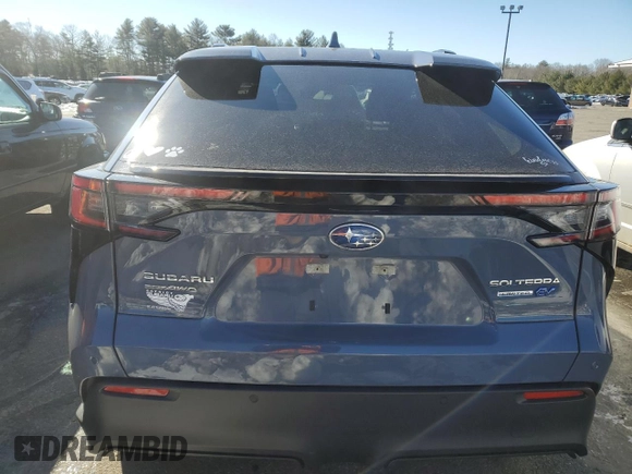 2023 Subaru Solterra Premium z VIN JTMABABA5PA019352, wystawiony jako Copart lot #43404604 z przebiegiem 9 903 mil mil oraz . Historia ofert i sprzedaży dostępna na DreamBid. Obrazek 6.