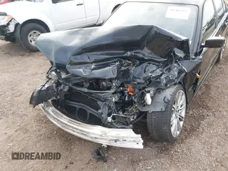 2005 BMW 3 Series 330i with VIN WBAEV53415KM08390, listed as a IAAI auction lot 41507259 with 192,211 mi miles. Bid and sale history available at carsss.com. Image 6.