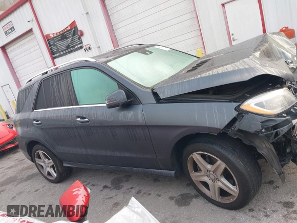 2014 Mercedes-Benz M 350 with VIN 4JGDA2EB2EA307963, listed as a IAAI auction lot 41582162 with 54,963 mi miles and . Bid and sale history available at DreamBid. Image 13.