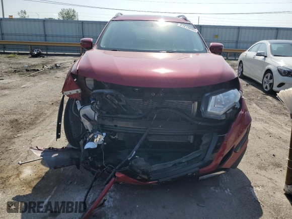 2017 Nissan Rogue SV with VIN 5N1AT2MV0HC794775, listed as a Copart auction lot 61019895 with 128,708 mi miles and Salvage title. Bid and sale history available at DreamBid. Image 5.