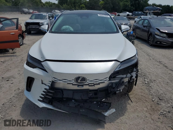 2024 Lexus RX with VIN 2T2BAMCAXRC071481, listed as a Copart auction lot 59457934 with 9,874 mi miles and Salvage Title. Bid and sale history available at carsss.com. Image 5.