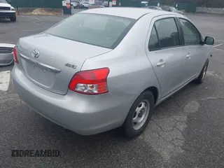 2009 Toyota Yaris with VIN JTDBT903694047246, listed as a IAAI auction lot 41961204 with 154,430 mi miles. Bid and sale history available at carsss.com. Image 4.