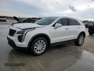 2021 Cadillac XT4 FWD Luxury z VIN 1GYAZAR48MF084877, wystawiony jako Copart lot #60689314 z przebiegiem 34 435 mil mil oraz Szkoda całkowita • Salvage title. Historia ofert i sprzedaży dostępna na DreamBid. Obrazek 1.