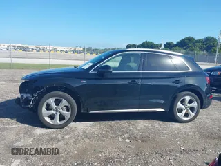 2023 Audi Q5 S line Premium Plus z VIN WA1EAAFY5P2128250, wystawiony jako IAAI lot #40666613 z przebiegiem 27 940 mil mil oraz . Historia ofert i sprzedaży dostępna na DreamBid. Obrazek 15.