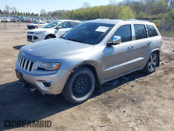 2014 Jeep Grand Cherokee Overland with VIN 1C4RJFCT9EC231840, listed as a IAAI auction lot 42114284 with 170,691 mi miles and . Bid and sale history available at DreamBid. Image 21.