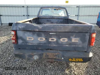 1988 Dodge Dakota z VIN 1B7GN14X5JS776983, wystawiony jako Copart lot #76597944 z przebiegiem 133 654 mil mil oraz Czysty tytuł • Clean title. Historia ofert i sprzedaży dostępna na DreamBid. Obrazek 6.