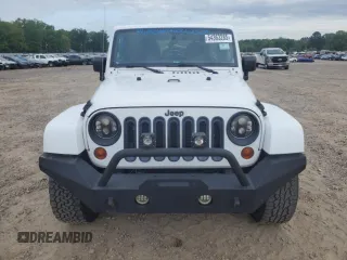 2012 Jeep Wrangler Unlimited Sahara with VIN 1C4HJWEG8CL126053, listed as a Copart auction lot 54363285 with 88,014 mi miles and Salvage title. Bid and sale history available at DreamBid. Image 5.