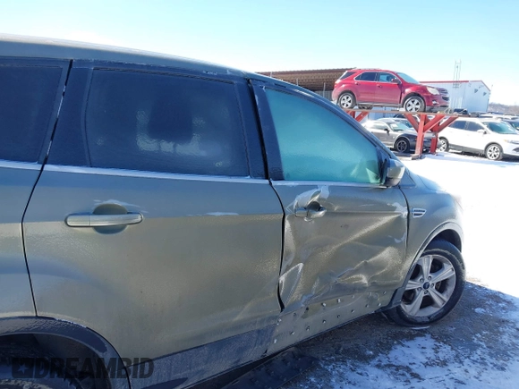 2013 Ford Escape SE with VIN 1FMCU0GX4DUC60741, listed as a IAAI auction lot 41592770 with 121,972 mi miles and . Bid and sale history available at DreamBid. Image 6.