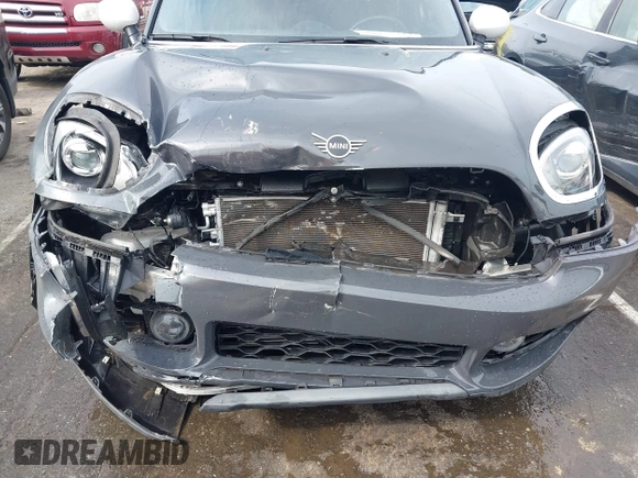 2020 MINI Countryman Cooper S with VIN WMZYW7C0XL3L85463, listed as a IAAI auction lot 42344478 with 54,654 mi miles and . Bid and sale history available at DreamBid. Image 6.