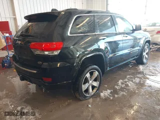 2014 Jeep Grand Cherokee Overland with VIN 1C4RJFCT7EC187319, listed as a IAAI auction lot 41256107 with 98,287 mi miles. Bid and sale history available at carsss.com. Image 4.