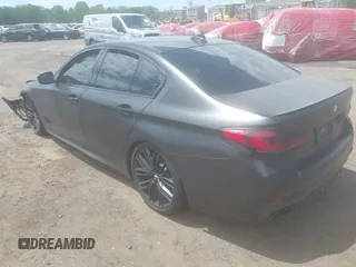 2023 BMW 5 Series M550i xDrive with VIN WBA13BK02PCN47443, listed as a IAAI auction lot 42290388 with Not provided miles and . Bid and sale history available at DreamBid. Image 3.