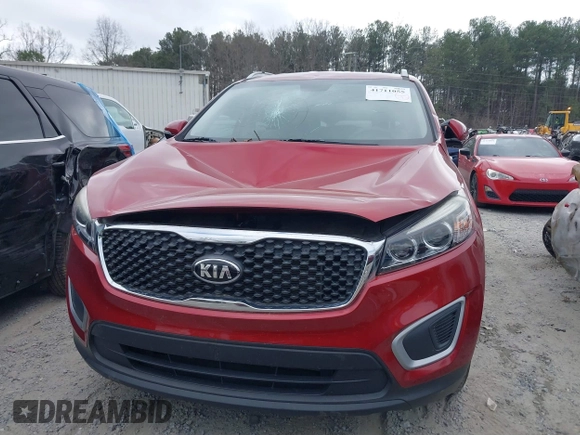2018 Kia Sorento LX z VIN 5XYPG4A39JG400774, wystawiony jako IAAI lot #41711055 z przebiegiem 56 046 mil mil oraz . Historia ofert i sprzedaży dostępna na DreamBid. Obrazek 12.