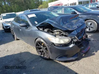 2014 Mazda 6 i Touring with VIN JM1GJ1V55E1105267, listed as a IAAI auction lot 41983743 with 159,266 mi miles. Bid and sale history available at carsss.com. Image 1.