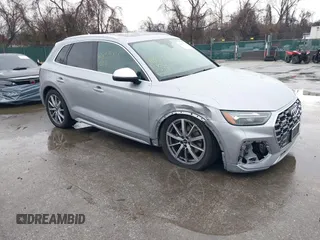 2023 Audi SQ5 Premium Plus z VIN WA1B4AFY9P2195394, wystawiony jako IAAI lot #41855818 z przebiegiem 25 946 mil mil oraz . Historia ofert i sprzedaży dostępna na DreamBid. Obrazek 1.