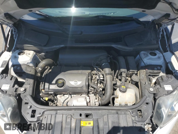 2016 MINI Countryman S with VIN WMWZC5C51GWU00690, listed as a Copart auction lot 55077095 with 104,176 mi miles and Salvage title. Bid and sale history available at DreamBid. Image 11.