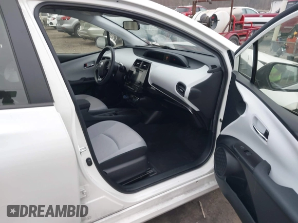 2019 Toyota Prius L Eco z VIN JTDKARFU8K3081187, wystawiony jako IAAI lot #41771346 z przebiegiem 64 864 mil mil oraz . Historia ofert i sprzedaży dostępna na DreamBid. Obrazek 5.