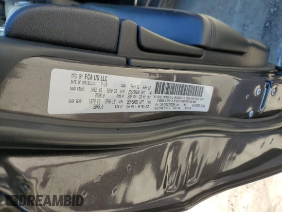 2019 Jeep Grand Cherokee Altitude with VIN 1C4RJEAG4KC858280, listed as a Copart auction lot 56534335 with 92,593 mi miles and Salvage title. Bid and sale history available at DreamBid. Image 14.