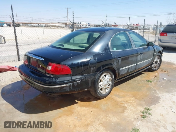2000 Mercury Sable LS Premium with VIN 1MEFM55SXYA645345, listed as a IAAI auction lot 41778827 with 196,746 mi miles. Bid and sale history available at carsss.com. Image 4.