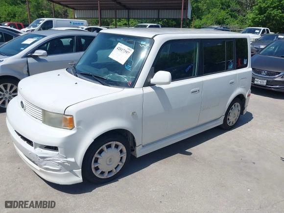 2006 Scion xB with VIN JTLKT324464115742, listed as a IAAI auction lot 42017397 with 203,140 mi miles. Bid and sale history available at carsss.com. Image 2.