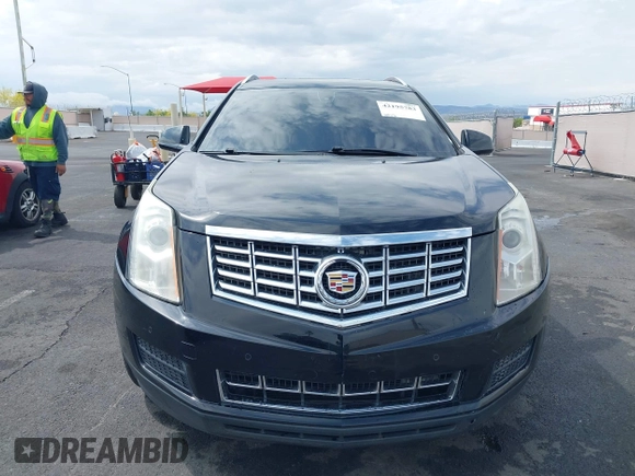 2014 Cadillac SRX Luxury Collection z VIN 3GYFNEE30ES650372, wystawiony jako IAAI lot #42195783 z przebiegiem 169 113 mil mil oraz . Historia ofert i sprzedaży dostępna na DreamBid. Obrazek 12.