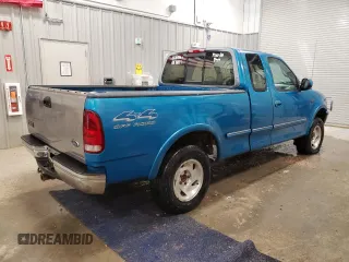 1997 Ford F-150 XL with VIN 1FTDX186XVKC03985, listed as a Copart auction lot 52808035 with 274,590 mi miles and Clean title. Bid and sale history available at DreamBid. Image 3.