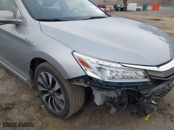 2017 Honda Accord Hybrid Touring with VIN JHMCR6F75HC016374, listed as a IAAI auction lot 41468778 with 180,618 mi miles. Bid and sale history available at carsss.com. Image 6.