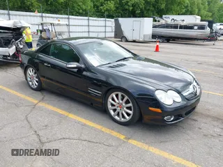 2007 Mercedes-Benz SL 550 z VIN WDBSK71F57F121921, wystawiony jako IAAI lot #42537737 z przebiegiem 101 435 mil mil oraz . Historia ofert i sprzedaży dostępna na DreamBid. Obrazek 1.