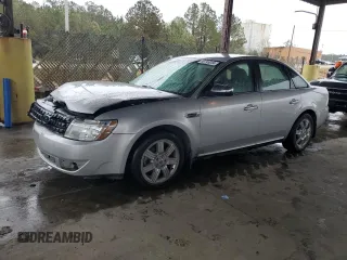 2009 Ford Taurus Limited with VIN 1FAHP25W09G100990, listed as a Copart auction lot 80745234 with 129,692 mi miles and Salvage Title. Bid and sale history available at carsss.com. Image 1.