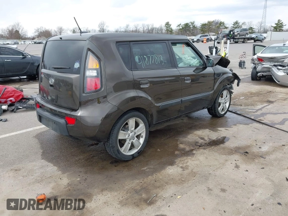 2010 Kia Soul + with VIN KNDJT2A21A7159044, listed as a IAAI auction lot 41877813 with 121,814 mi miles. Bid and sale history available at carsss.com. Image 4.