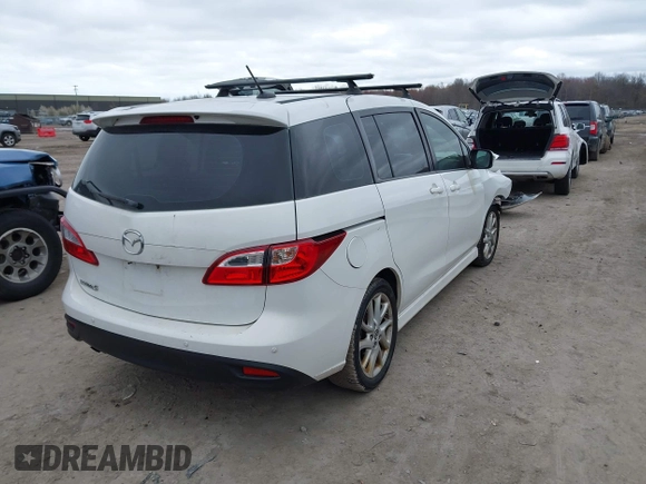 2013 Mazda Mazda5 Grand Touring with VIN JM1CW2DL7D0160703, listed as a IAAI auction lot 42050226 with 133,702 mi miles. Bid and sale history available at carsss.com. Image 4.