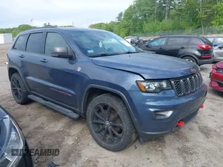 2020 Jeep Grand Cherokee Trailhawk with VIN 1C4RJFLGXLC218661, listed as a IAAI auction lot 42363213 with 61,444 mi miles and . Bid and sale history available at DreamBid. Image 1.