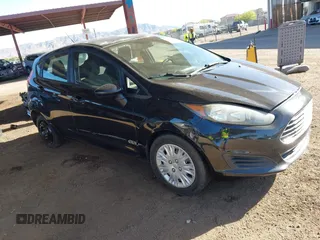 2015 Ford Fiesta S z VIN 3FADP4TJ5FM138864, wystawiony jako IAAI lot #42063538 z przebiegiem 100 854 mil mil oraz . Historia ofert i sprzedaży dostępna na DreamBid. Obrazek 1.