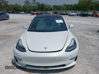 2019 Tesla Model 3 Long Range with VIN 5YJ3E1EB4KF494432, listed as a IAAI auction lot 42009327 with 121,954 mi miles and . Bid and sale history available at DreamBid. Image 12.