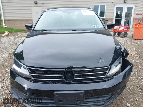 2017 Volkswagen Jetta S z VIN 3VW2B7AJ3HM303198, wystawiony jako IAAI lot #42651056 z przebiegiem 126 253 mil mil oraz . Historia ofert i sprzedaży dostępna na DreamBid. Obrazek 13.