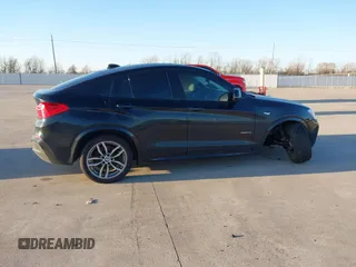2018 BMW X4 xDrive28i with VIN 5UXXW3C59J0T80560, listed as a IAAI auction lot 41734915 with 122,850 mi miles. Bid and sale history available at carsss.com. Image 13.
