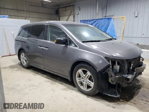 2013 Honda Odyssey Touring with VIN 5FNRL5H91DB024040, listed as a Copart auction lot 57241615 with 163,788 mi miles and Salvage title. Bid and sale history available at DreamBid. Image 4.