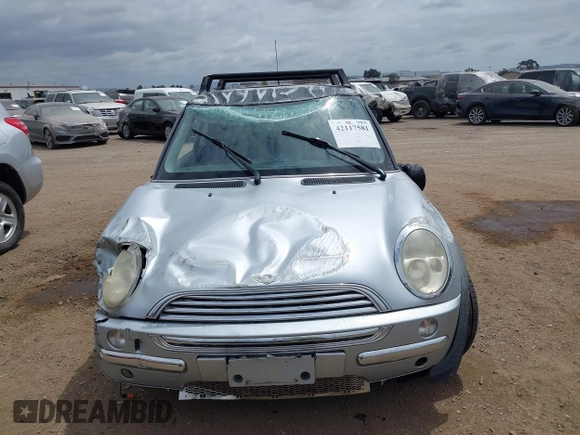 2004 MINI Hardtop with VIN WMWRC33434TJ57506, listed as a IAAI auction lot 42117581 with 148,483 mi miles and . Bid and sale history available at DreamBid. Image 6.