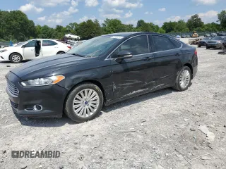 2013 Ford Fusion SE Hybrid z VIN 3FA6P0LU7DR288731, wystawiony jako Copart lot #63902215 z przebiegiem 124 176 mil mil oraz Szkoda całkowita • Salvage title. Historia ofert i sprzedaży dostępna na DreamBid. Obrazek 1.