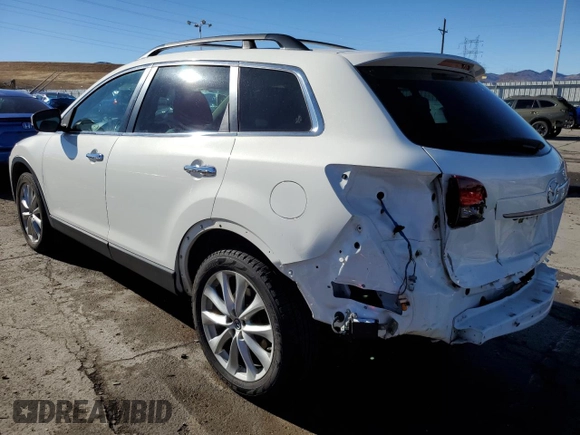 2015 Mazda CX-9 Grand Touring с VIN JM3TB2DA1F0462203, выставлен на аукционе Copart как лот 37073714 с пробегом 101 293 миль миль и Списание • Salvage title. История ставок и продаж доступна на DreamBid. Изображение 2.