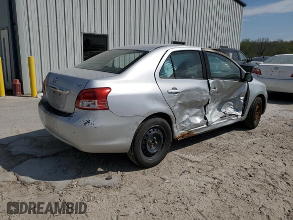 2009 Toyota Yaris with VIN JTDBT903391300394, listed as a Copart auction lot 53392945 with 227,210 mi miles and Salvage Title. Bid and sale history available at DreamBid. Image 3.