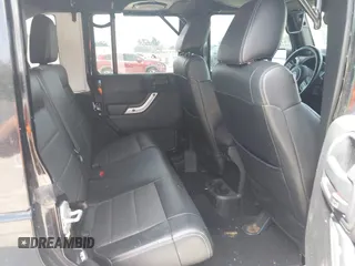 2012 Jeep Wrangler Unlimited Altitude with VIN 1C4HJWEG5CL161049, listed as a IAAI auction lot 42629330 with 217,147 mi miles and . Bid and sale history available at DreamBid. Image 8.
