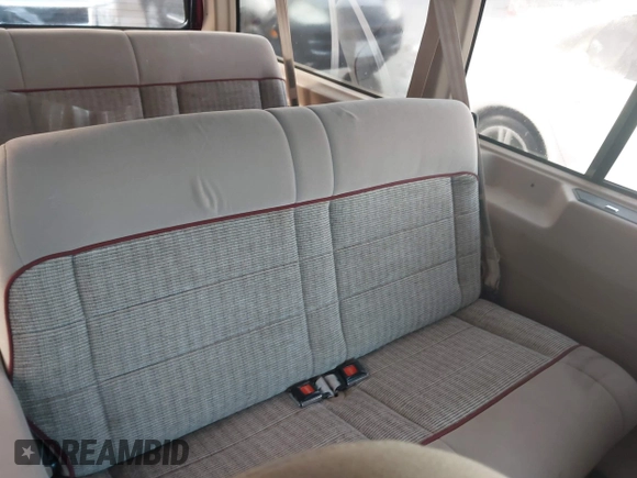 1996 Ford Aerostar z VIN 1FMDA31X1TZC09092, wystawiony jako IAAI lot #41784476 z przebiegiem 173 065 mil mil oraz . Historia ofert i sprzedaży dostępna na DreamBid. Obrazek 8.