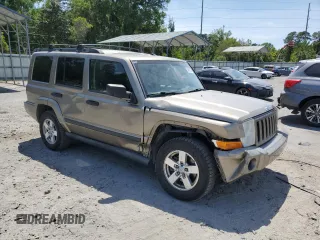 2006 Jeep Commander with VIN 1J8HG48N06C274675, listed as a Copart auction lot 54521835 with 134,587 mi miles and Salvage Title. Bid and sale history available at DreamBid. Image 4.