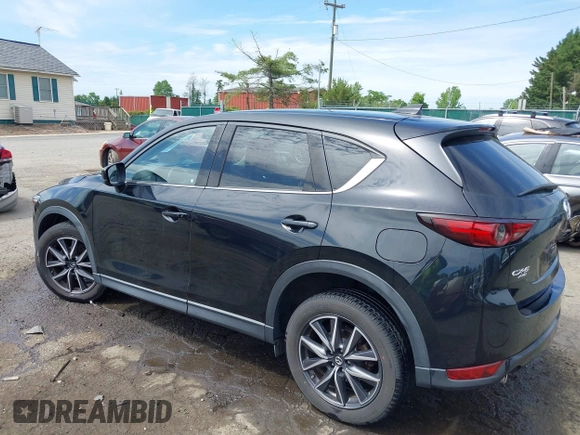 2018 Mazda CX-5 Grand Touring z VIN JM3KFBDM5J0307785, wystawiony jako IAAI lot #42302609 z przebiegiem 81 974 mil mil oraz . Historia ofert i sprzedaży dostępna na DreamBid. Obrazek 3.