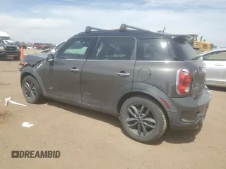 2013 MINI Countryman S ALL4 z VIN WMWZC5C56DWM16203, wystawiony jako Copart lot #54346425 z przebiegiem 148 065 mil mil oraz Szkoda całkowita • Salvage title. Historia ofert i sprzedaży dostępna na DreamBid. Obrazek 2.