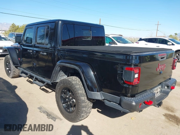 2020 Jeep Gladiator Rubicon z VIN 1C6JJTBG0LL117908, wystawiony jako IAAI lot #41621920 z przebiegiem 61 233 mil mil oraz . Historia ofert i sprzedaży dostępna na DreamBid. Obrazek 3.