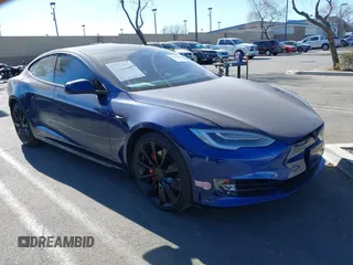 2020 Tesla Model S Long Range with VIN 5YJSA1E26LF411172, listed as a IAAI auction lot 41318180 with 45,332 mi miles and . Bid and sale history available at DreamBid. Image 1.