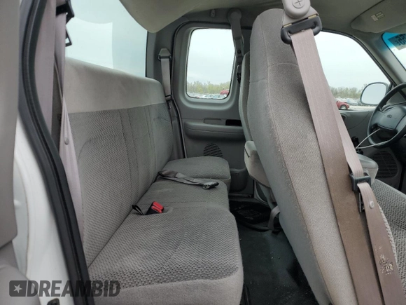 1999 Ford F-150 with VIN 2FTRX17W3XCA68816, listed as a Copart auction lot 53080755 with 201,501 mi miles and Salvage Title. Bid and sale history available at DreamBid. Image 11.